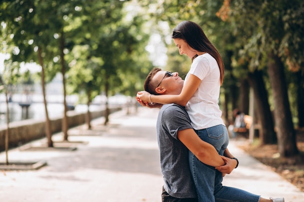 Happy couple together in park