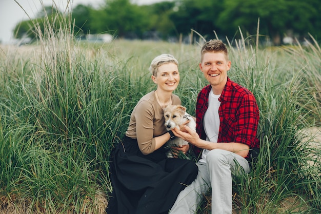 happy couple with dog