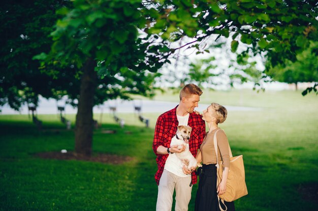 happy couple with dog