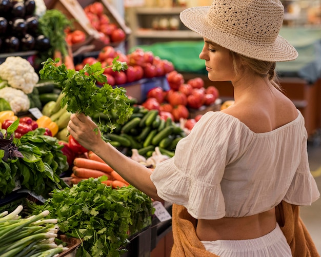 Happy customer buying parsley leaves