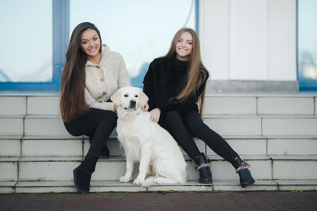 happy cute woman with dog outdoor