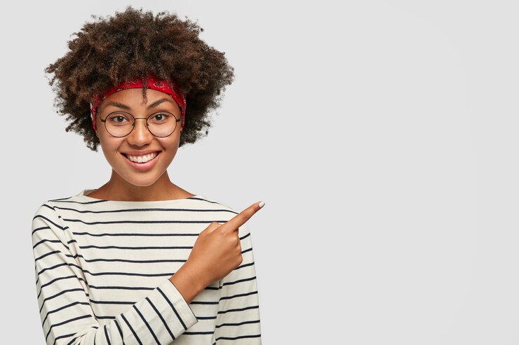Free Photo happy delighted freelancer with afro hairstyle