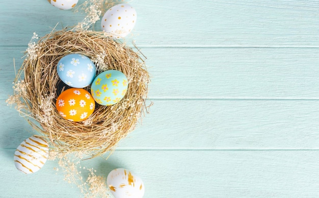 Free photo happy easter day easter eggs on wooden background