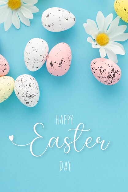 Happy easter poster with eggs and daisies on a blue background