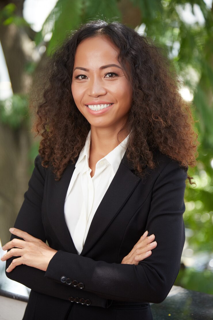 Free Photo happy ethnic executive woman looking at camera
