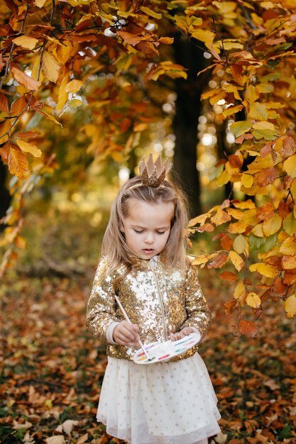 Happy family on autumn walk