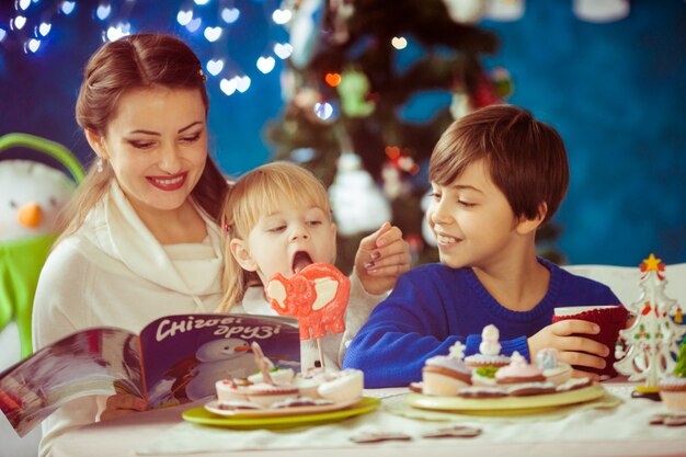 Happy family in the christmas studio