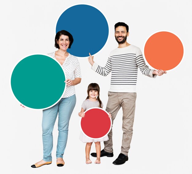 Happy family holding round colorful boards