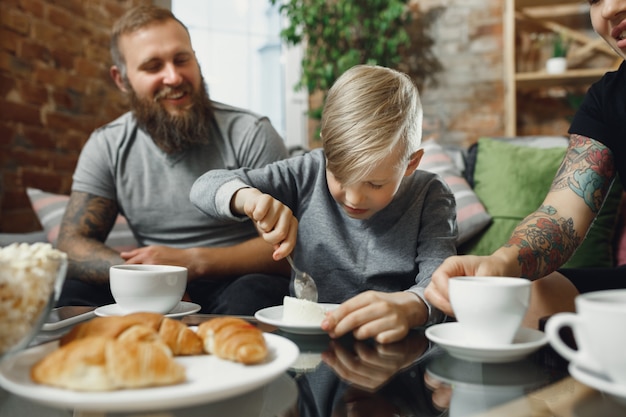 Happy family at home spending time together. Having fun, look cheerful and lovely.