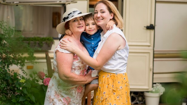 Happy family hugging for a photo