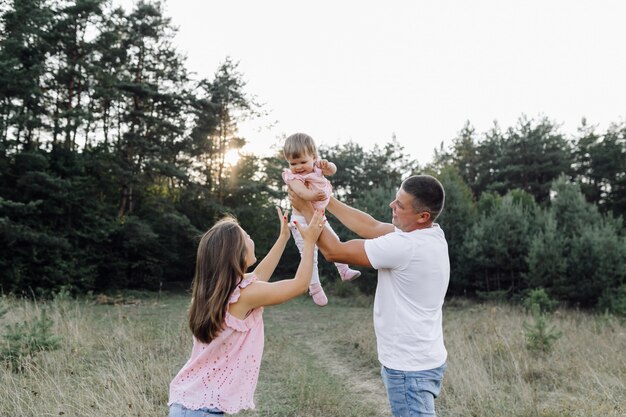 Happy family outdoors spending time together