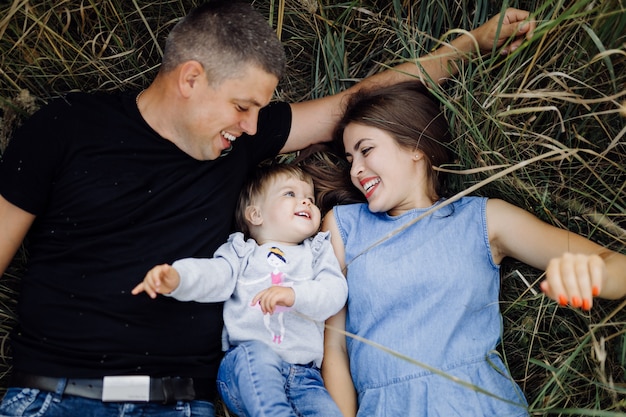 Happy family outdoors spending time together