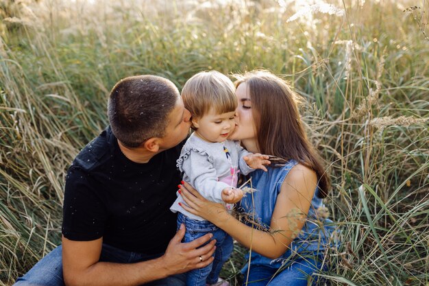 Happy family outdoors spending time together