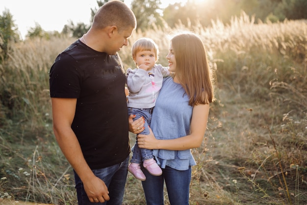 Happy family outdoors spending time together