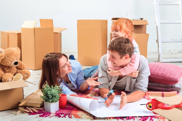 The happy family during repair and relocation