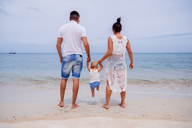 Happy family on vacation with little baby boy