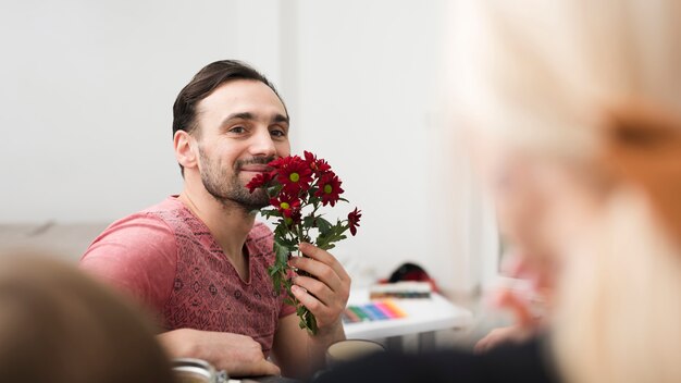 Happy father with daisies for father's day