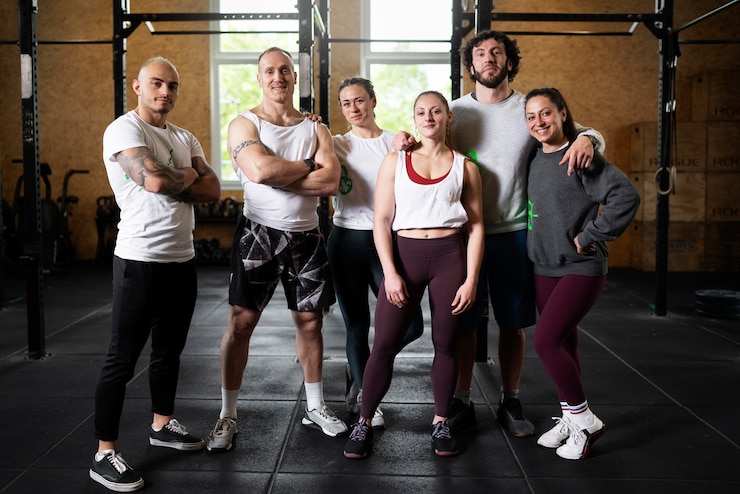 Free Photo happy fit people at gym full shot