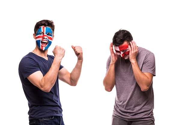 Free photo happy football fan of iceland celebrate win over upset football fan of croatia with painted face