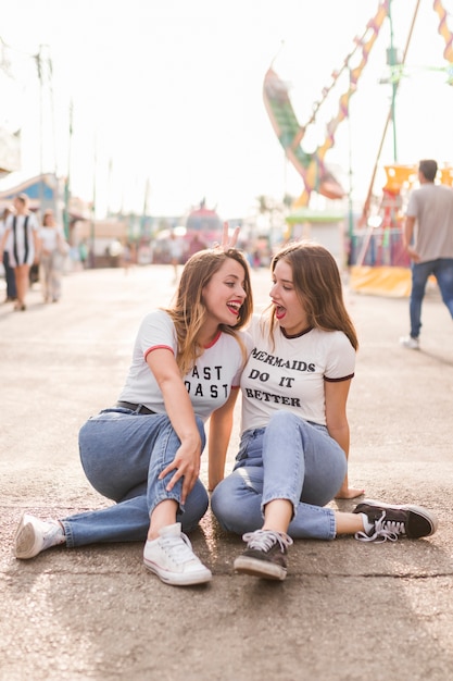 Happy friends in the amusement park