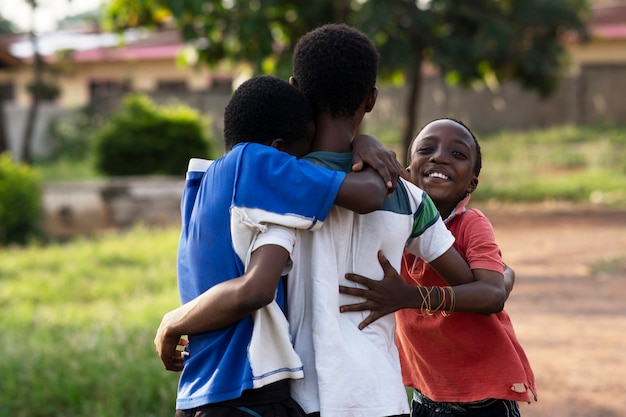 Happy friends hugging medium shot