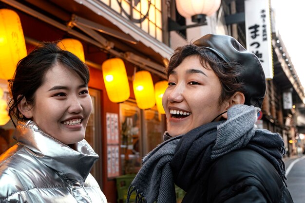 Happy friends spending time together outside