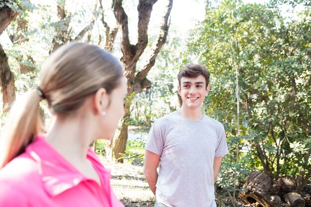 Happy friends talking after exercise