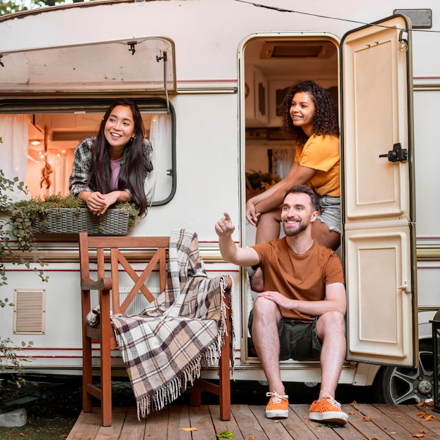 Happy friends in a van