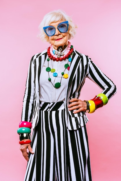 Premium Photo | Happy and funny cool old lady with fashionable clothes ...