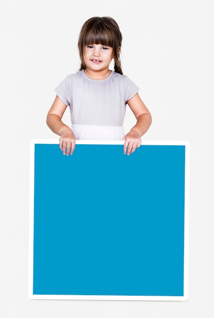 Happy girl holding an empty square board