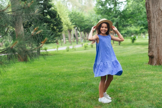 Happy girl posing outdoors