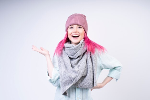 Happy girl with scraf and rose hat