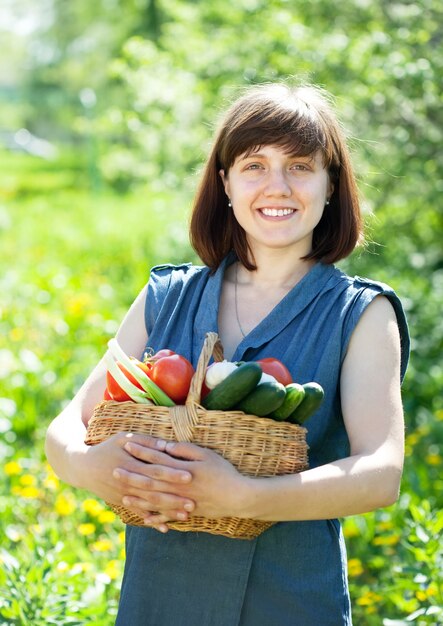 Happy girl with vegetables