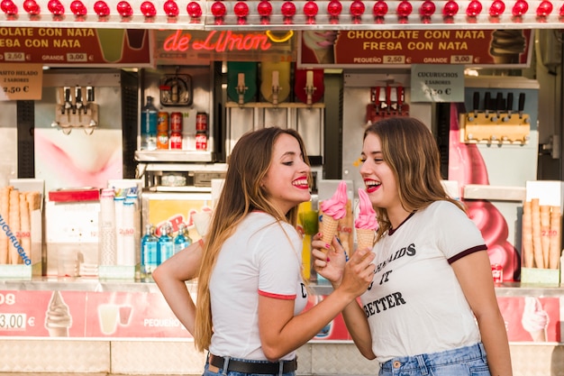 Happy girls having fun in the amusement park