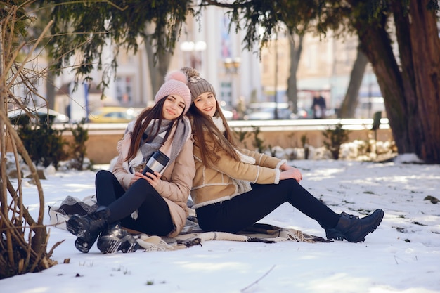 Happy girls in a winter city