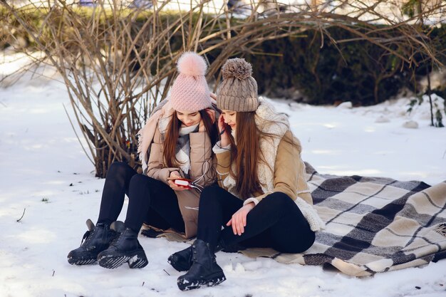 Happy girls in a winter city