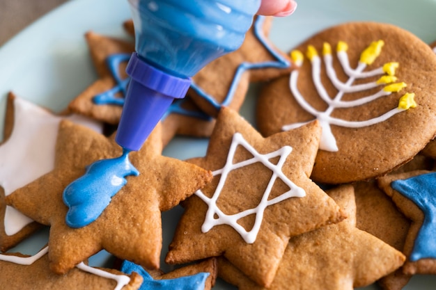 Happy hanukkah holiday cookies with symbols
