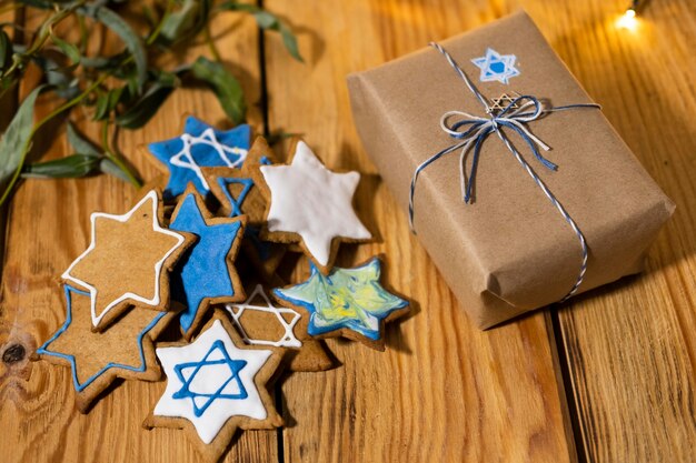 Happy hanukkah holiday star of david cookies and gift