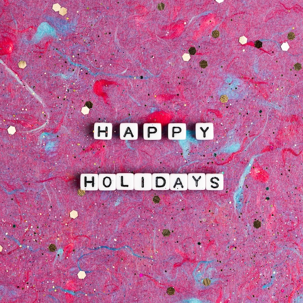 Foto gratuita happy holidays perline testo tipografia