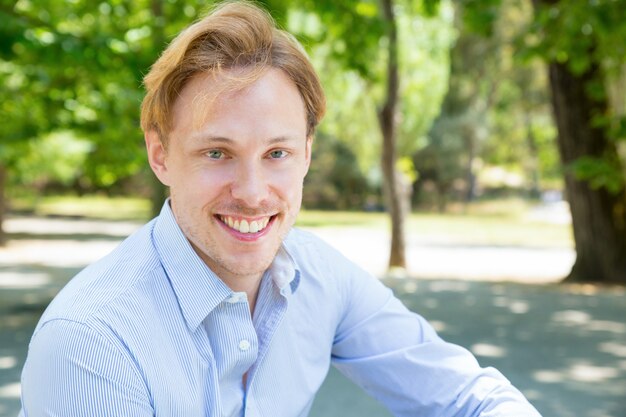 Happy joyful guy enjoying leisure time