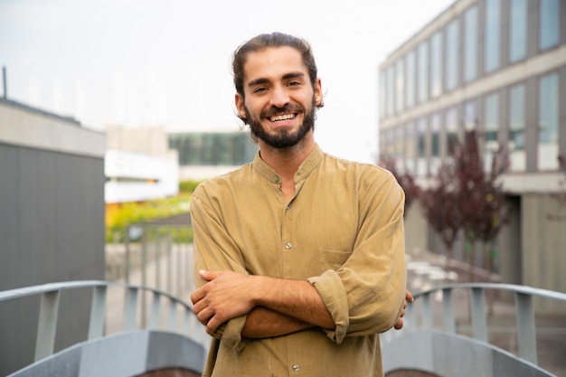 Free photo happy joyful hipster guy posing