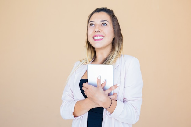 Free photo happy joyful tablet user thanking god