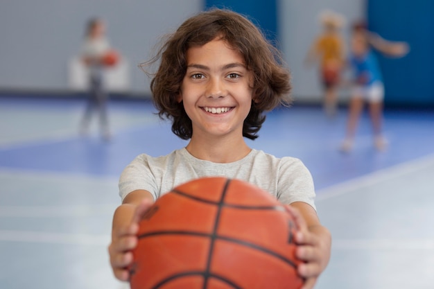 Happy kid enjoying his gym class