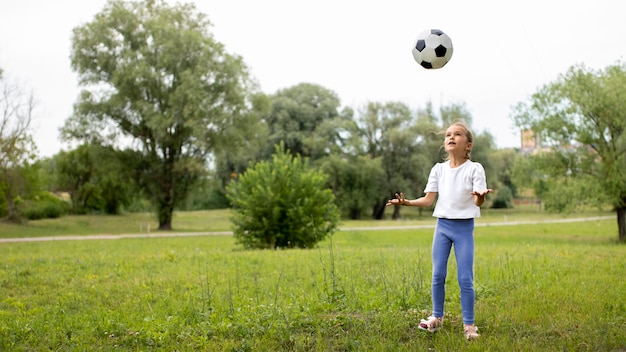 Happy kid playing outdoors