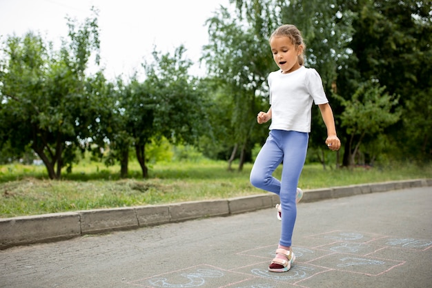 Happy kid playing outdoors