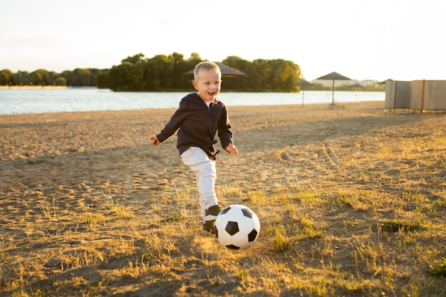 Happy kid playing outdoors