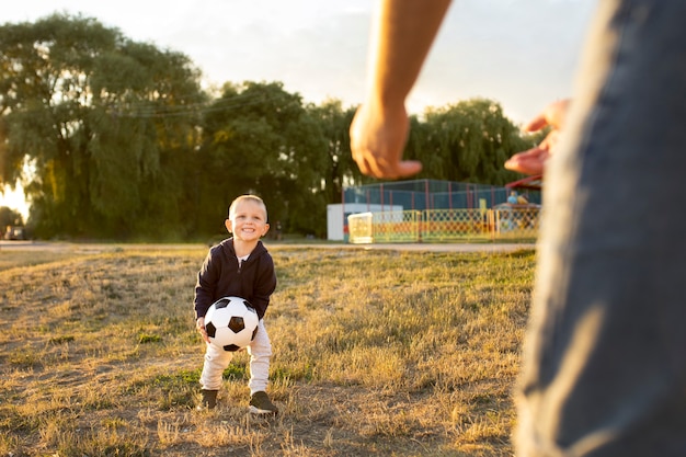 Free photo happy kid playing outdoors