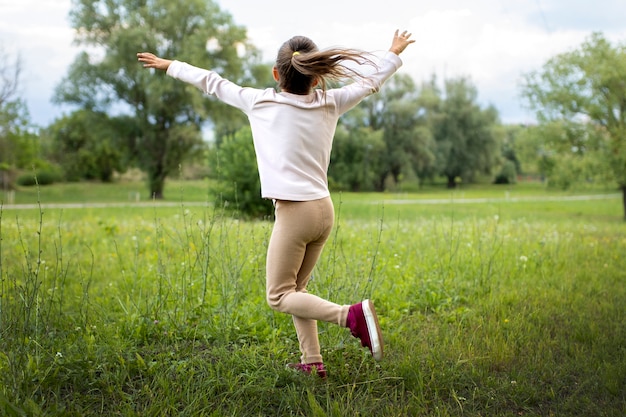 Happy kid playing outdoors