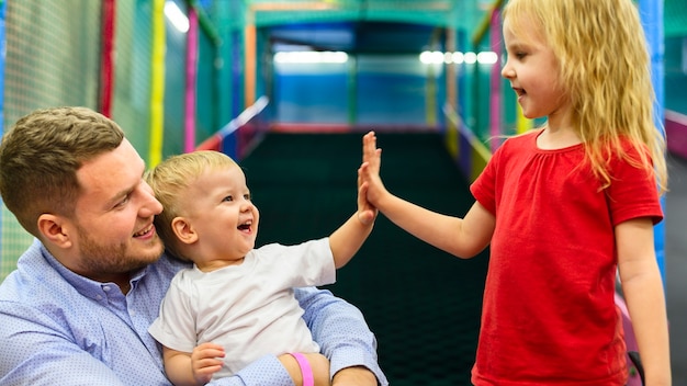 Happy kids high fiving