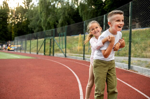 Happy kids playing outdoors